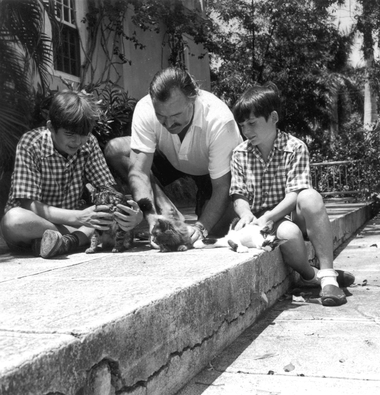 Hemingway with Patrick on the left and Greg on the right